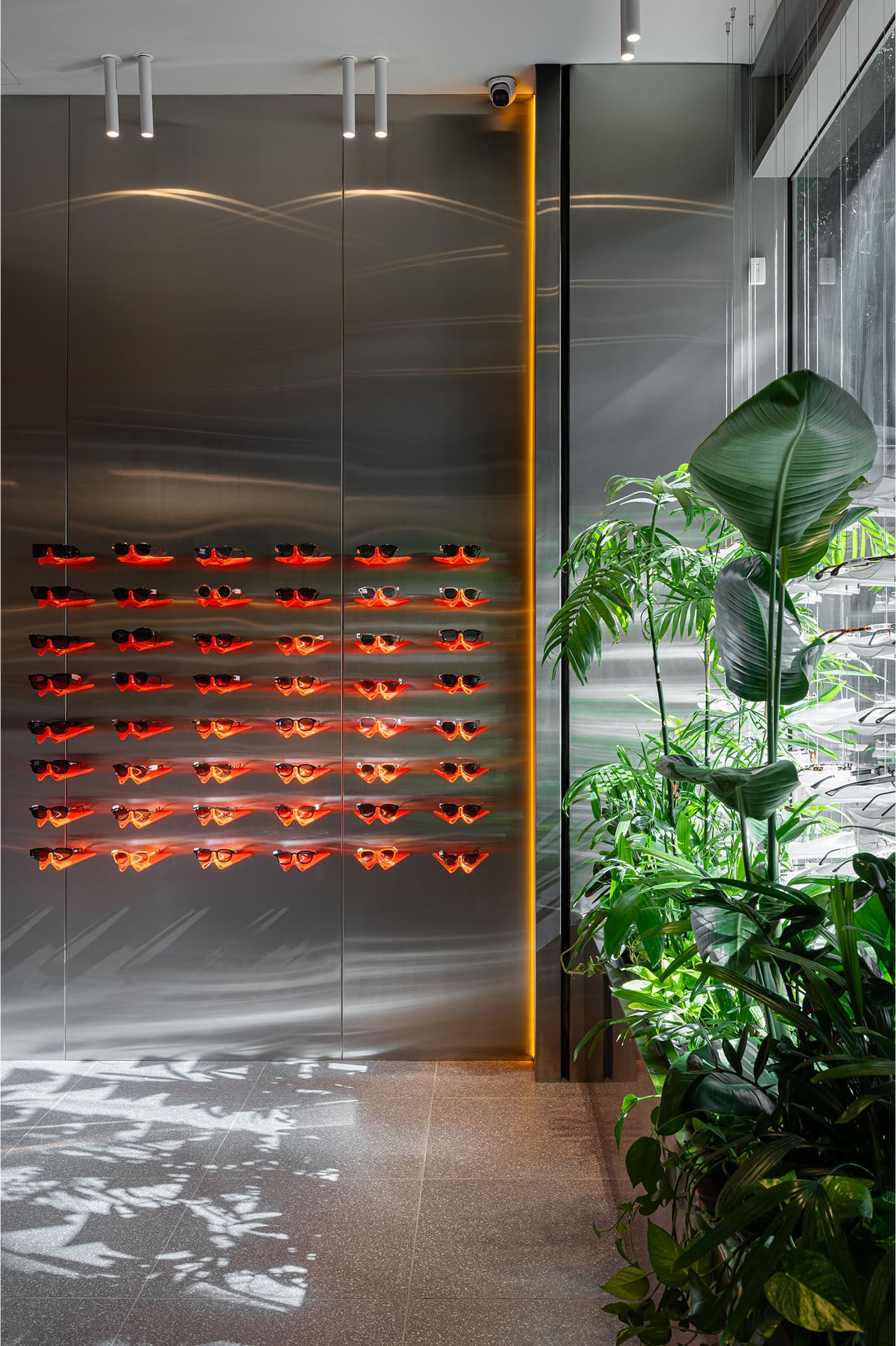 Store entrance — stainless steel and plants