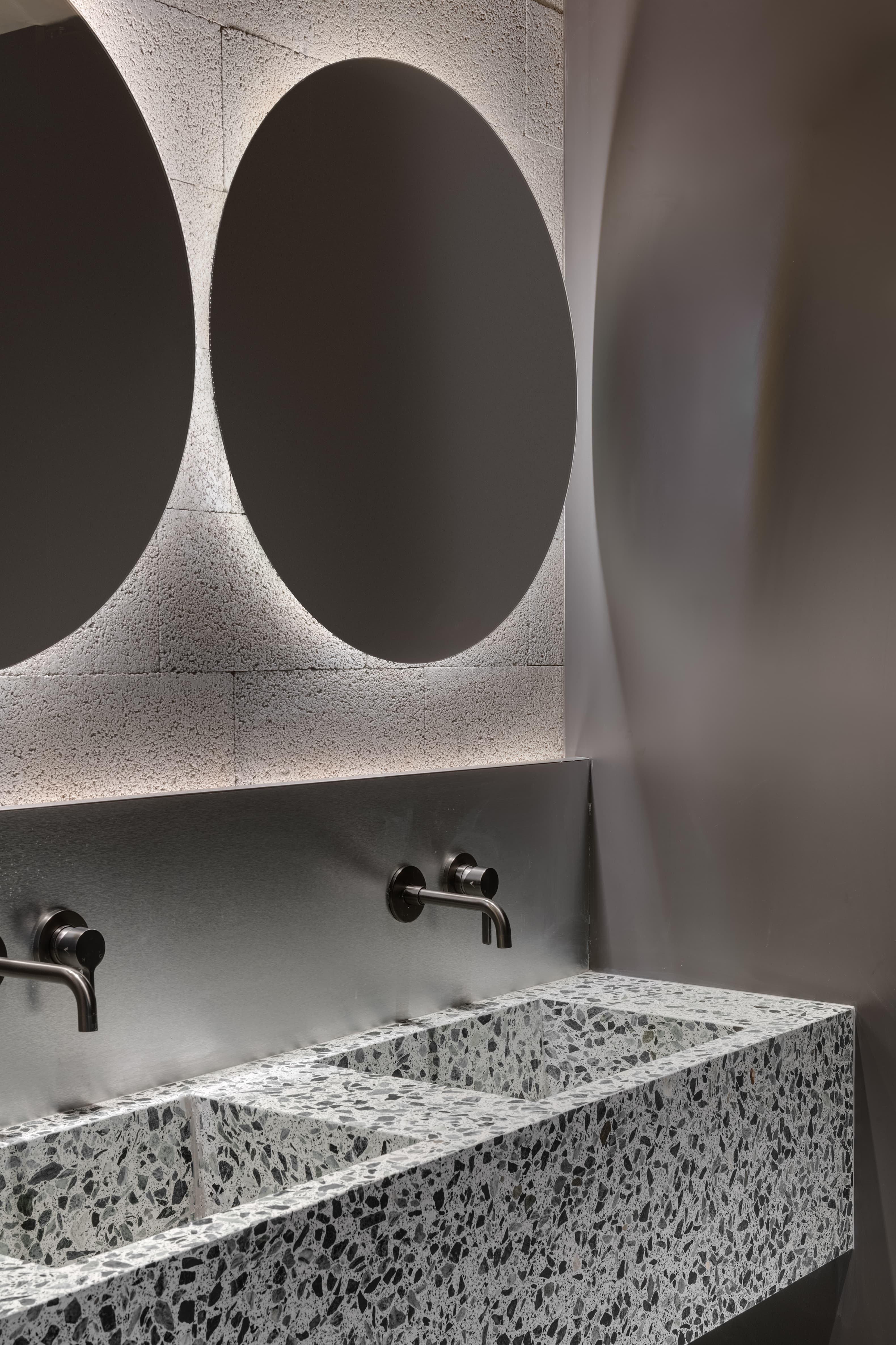 LYN Tower — restroom concrete block wall