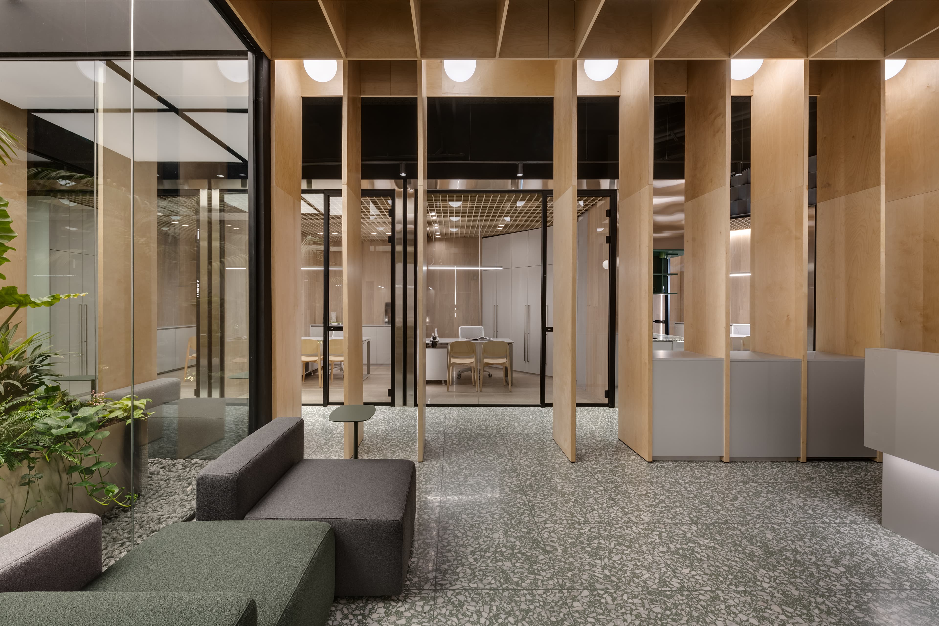Tel Ad Office — terrazzo floor and wood