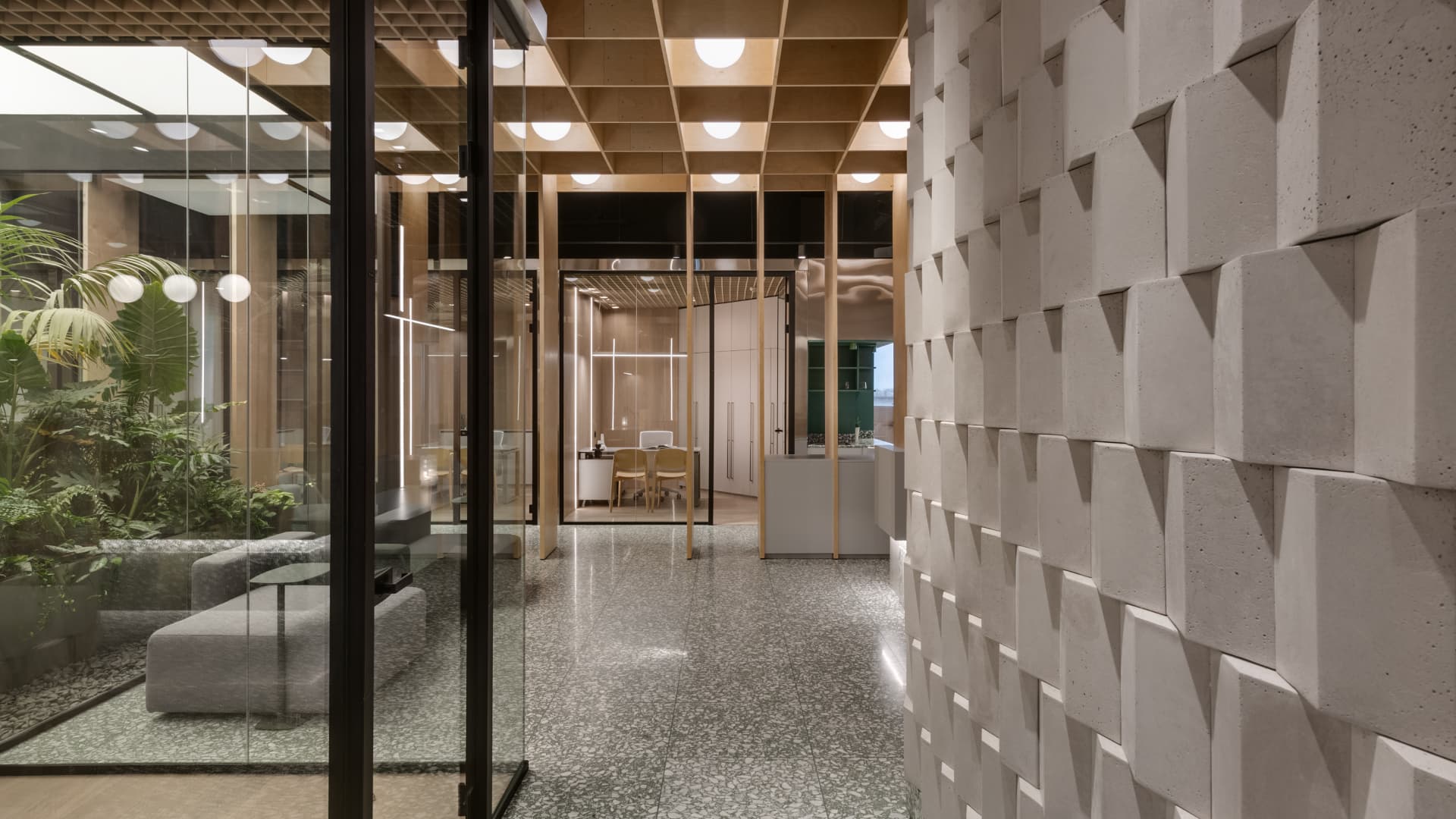 Tel Ad — corridor with 3D concrete wall