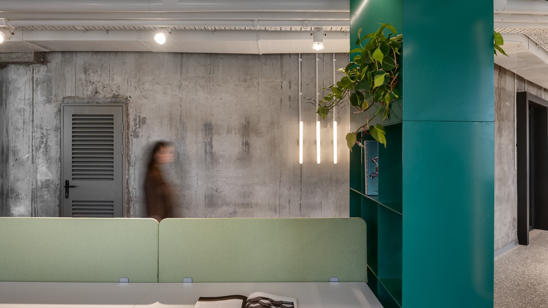LYN Office — concrete and teal column